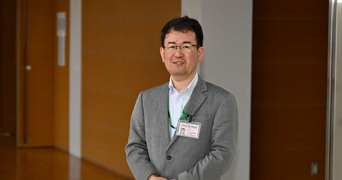 中川達功
